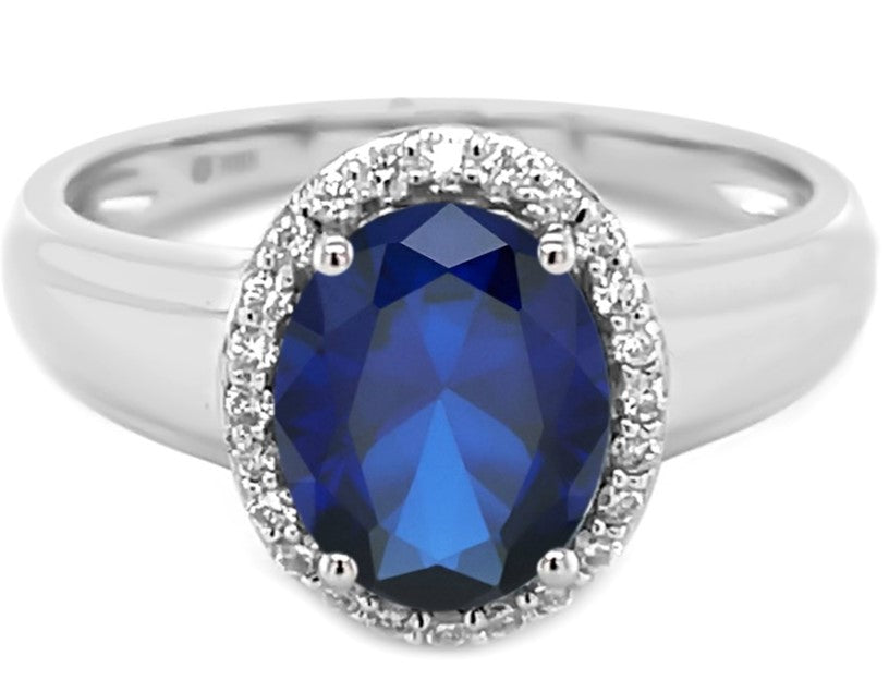 Echte grote saffier en gesimuleerde diamanten ring 