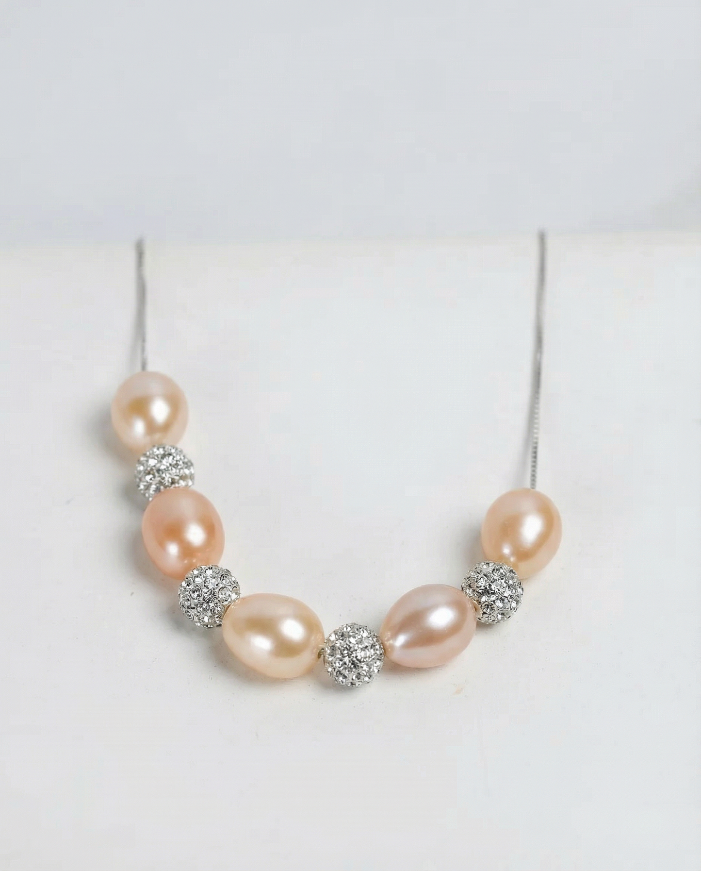 Echte perzikparel en zirkoon ketting