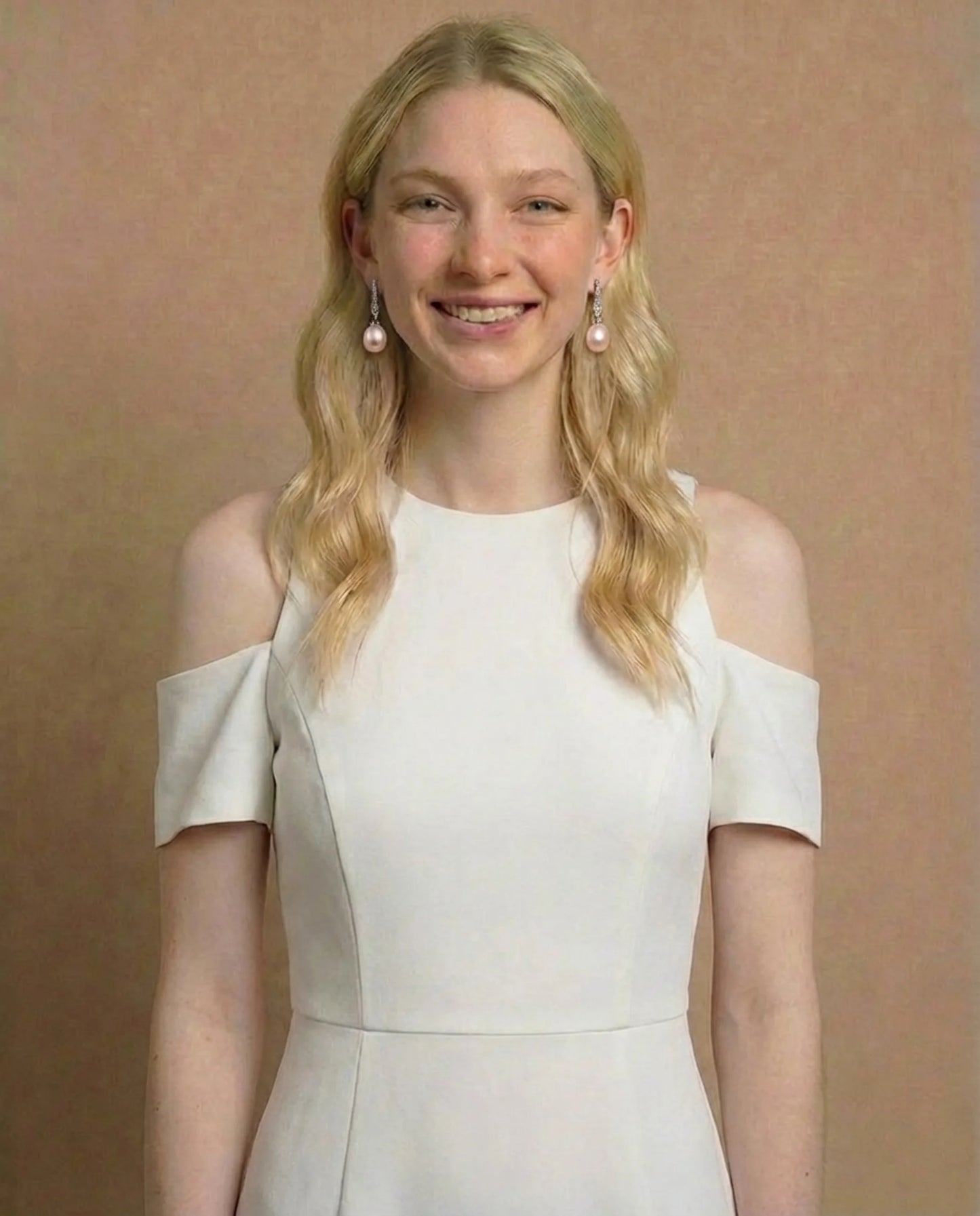 Elegante perzikparel oorbellen 
