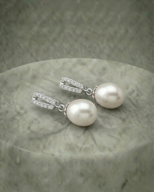 Elegante ivoren pareloorbellen 