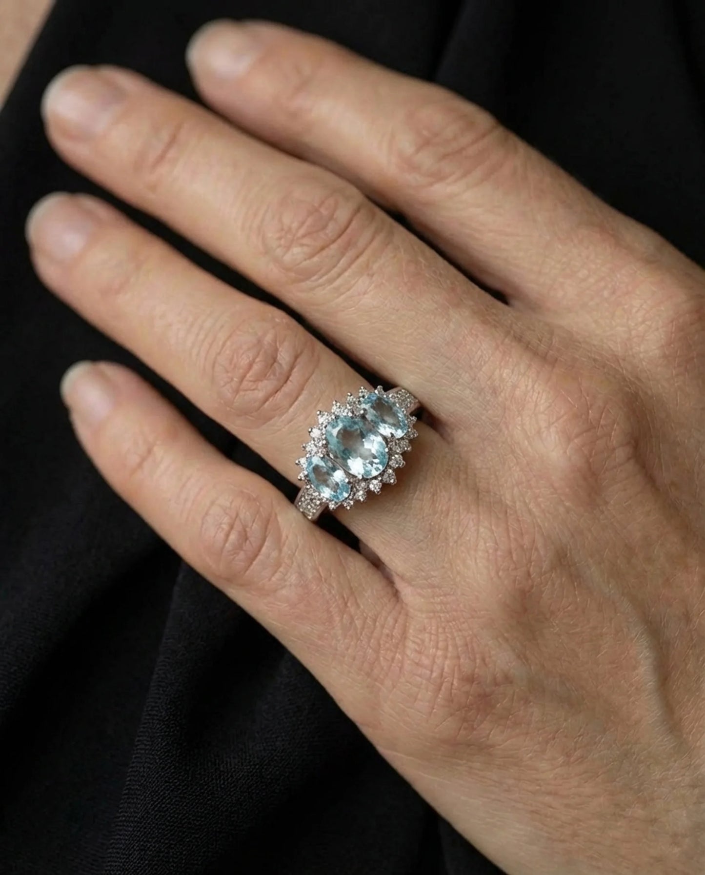 Echte Topaas drie stenen diamanten ring