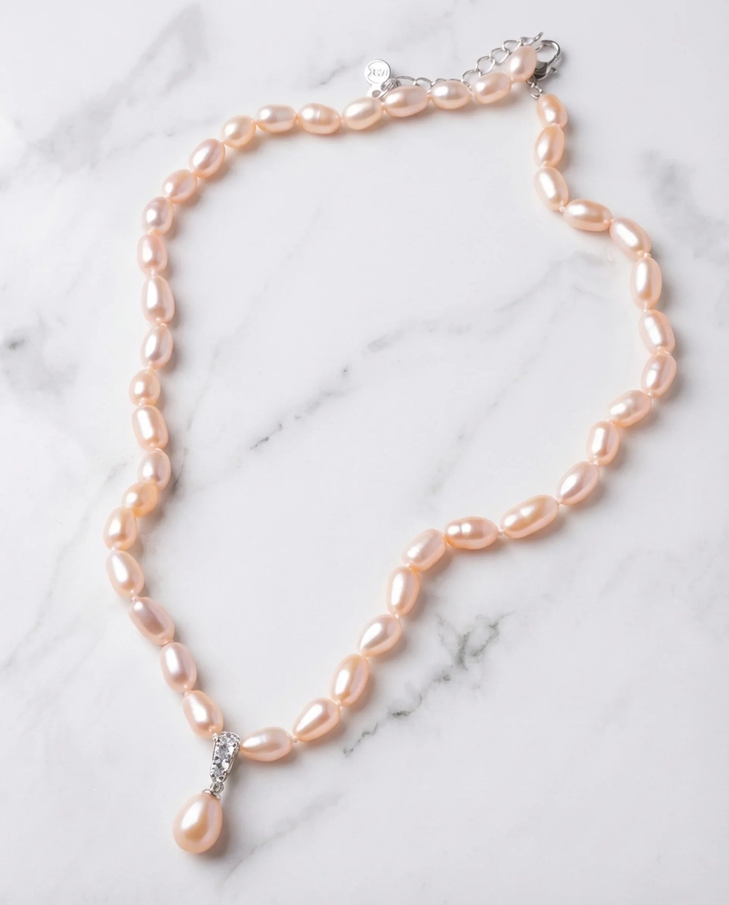 Roze parelketting met hanger 