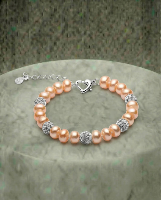 Perzikparel en zirkoon armband 